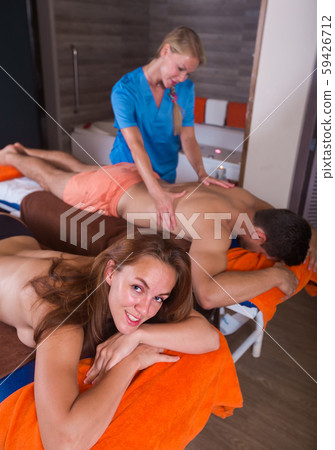 Man with girlfriend are relaxing in massage cabinet. 59426712