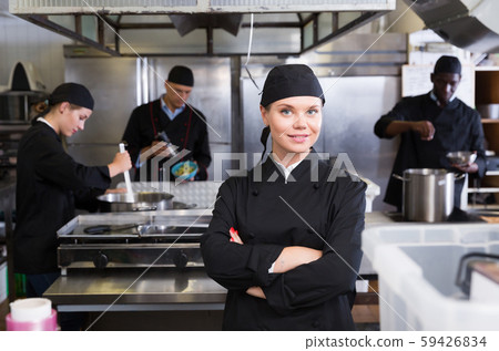 Confident young woman chef Confident young woman chef 59426834