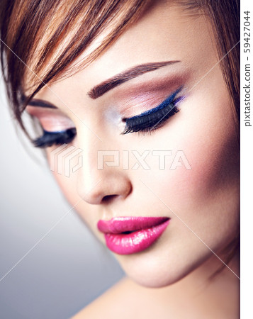 Closeup face of an amazing girl with sexy lips. Closeup face of an amazing girl with sexy lips. 59427044