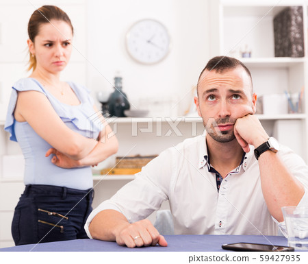 Man is upset because he quarrel with his wife Man is upset because he quarrel with his wife 59427935