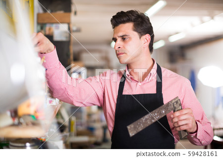 Joiner looking for necessary tools Joiner looking for necessary tools 59428161