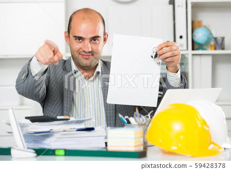 Professional man working with documents Professional man working with documents 59428378