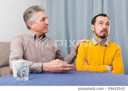 Mature father and son serious talk Mature father and son serious talk 59428542