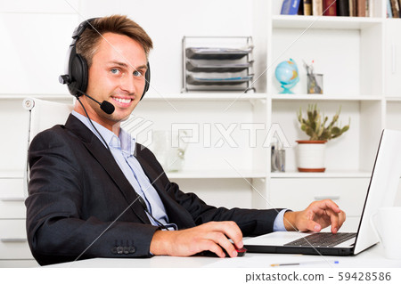 Man talking using hands-free set 59428586