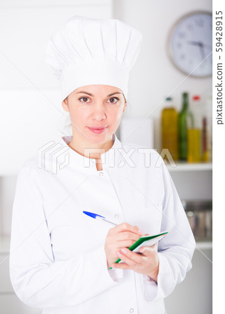 Female cook in cafe 59428915