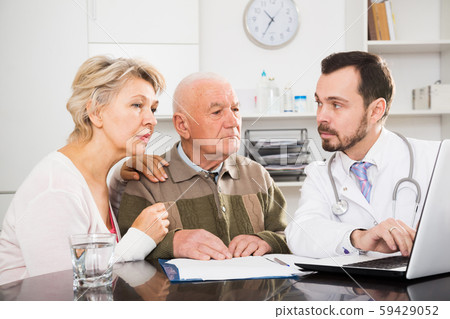 Couple visiting doctor Couple visiting doctor 59429052