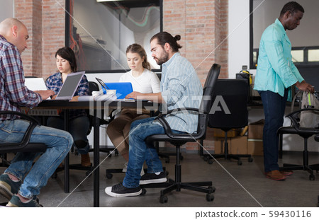 Business team working in coworking space Business team working in coworking space 59430116
