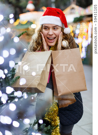 Emotional portrait of smiling young woman 59431105