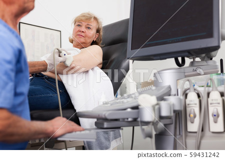 Female patient during ultrasound diagnostic 59431242