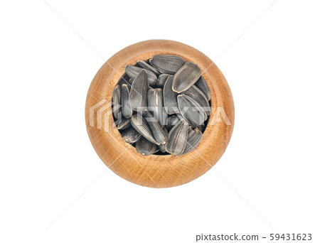 Sunflower seeds in bowl Sunflower seeds in bowl 59431623
