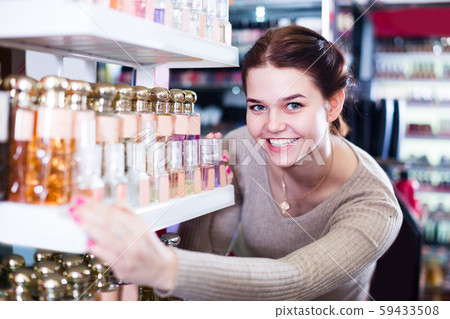 Girl is searching for strong perfume Girl is searching for strong perfume 59433508