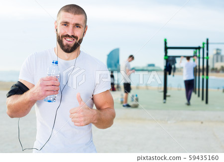 Portrait of man on sportsground Portrait of man on sportsground 59435160