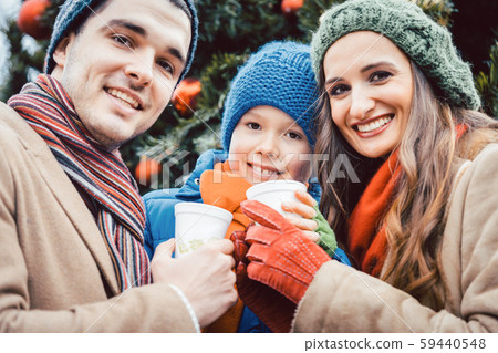 Family visiting Christmas Market 59440548