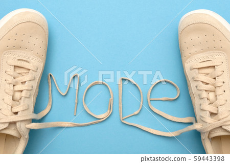 New women sneakers with laces in mode text. 59443398