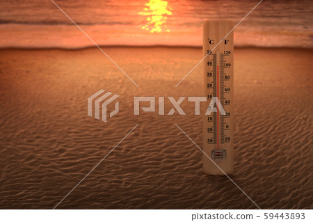 Thermometer measuring the temperature on the beach Thermometer measuring the temperature on the beach 59443893