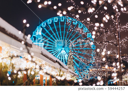 Christmas zone on Kontraktova Square with a Ferris wheel Christmas zone on Kontraktova Square with a Ferris wheel 59444257