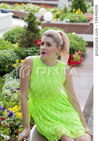 portrait of a girl crouched at the floral scenery portrait of a girl crouched at the floral scenery 59446606