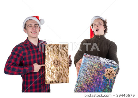 Two funny young men celebrating christmas isolated Two funny young men celebrating christmas isolated 59446679