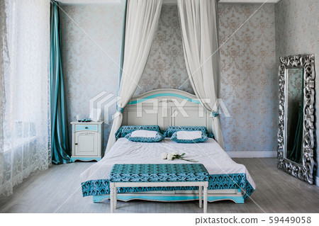 Stylish loft cozy bedroom wooden bed with clean linen bedding. Modern interior Stylish loft cozy bedroom wooden bed with clean linen bedding. Modern interior 59449058