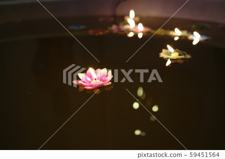 Thai Loi Krathong tradition uses materials made from candles floating in the water. Thai Loi Krathong tradition uses materials made from candles floating in the water. 59451564