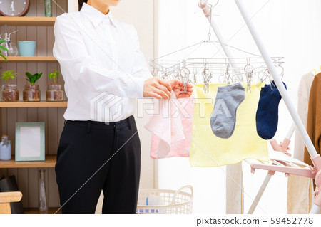 Housework before going to work Laundry Business woman Drying indoors Rain forecast Pollen measures 59452778