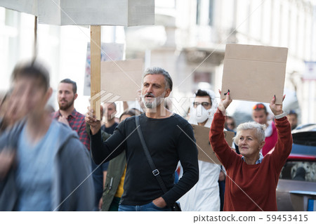People with placards and posters on global strike for climate change. People with placards and posters on global strike for climate change. 59453415