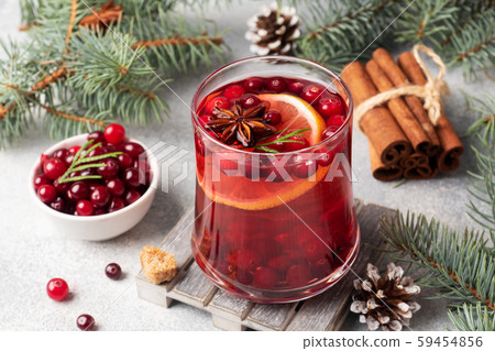 Cranberry juice with lemon and cane sugar. Winter hot drink. Copy space Cranberry juice with lemon and cane sugar. Winter hot drink. Copy space 59454856