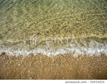 Closed up of sea wave moving on the sand beach 59454924