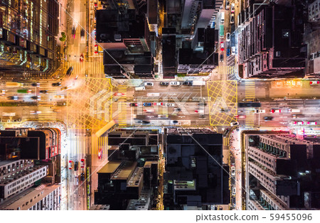 Car, taxi, and bus traffic on road intersection at night in Hong Kong downtown district, drone aerial top view. Street commuter, Asia city life, or public transportation concept Car, taxi, and bus traffic on road intersection at night in Hong Kong downtown district, drone aerial top view. Street commuter, Asia city life, or public transportation concept 59455096