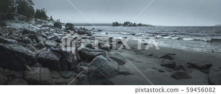 Panorama of a rocky shore. Overcast day. Panorama of a rocky shore. Overcast day. 59456082