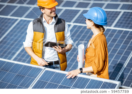 Engineers on a solar power station Engineers on a solar power station 59457789