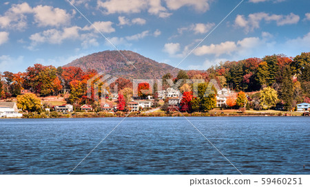 Fall Landscape showing Lake houses with reflections in Lake Junaluska 59460251