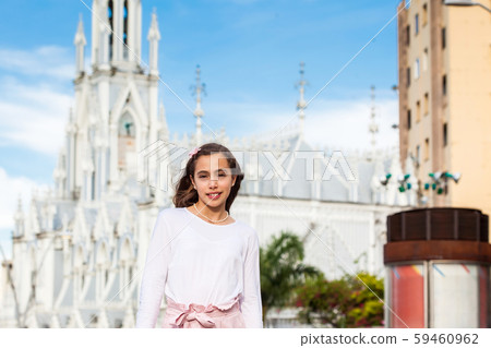 Girl at the River Boulevard in front of the famous gothic church of La Ermita in Cali 59460962