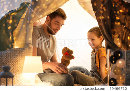 happy family playing with toy in kids tent at home 59466710