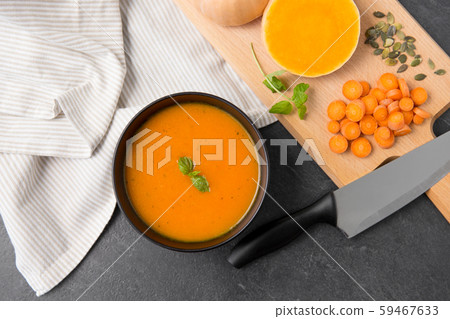 close up of vegetable pumpkin cream soup in bowl 59467633
