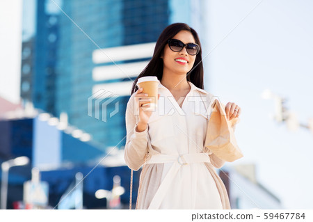 happy woman with takeaway coffee and lunch in city happy woman with takeaway coffee and lunch in city 59467784