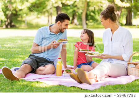 happy family having picnic at summer park happy family having picnic at summer park 59467788