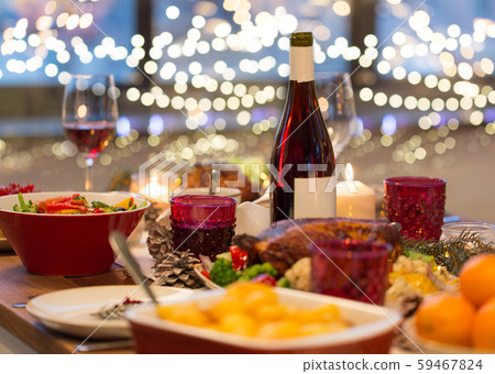 food and drinks on christmas table at home 59467824