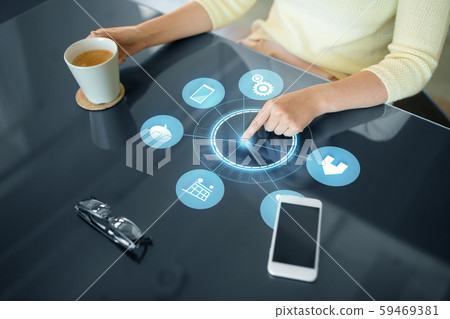woman with coffee using black interactive panel woman with coffee using black interactive panel 59469381
