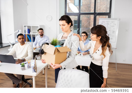 colleague soothing sad fired female office 