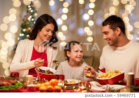 happy family having christmas dinner at home 59469771