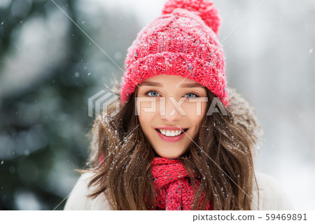 smiling teenage girl outdoors in winter smiling teenage girl outdoors in winter 59469891