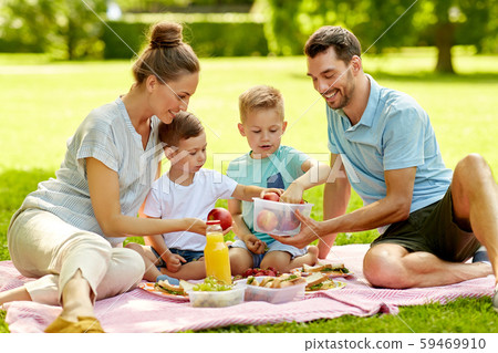 happy family having picnic at summer park happy family having picnic at summer park 59469910