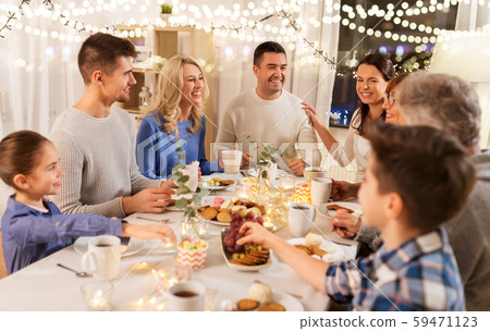 happy family having tea party at home 59471123