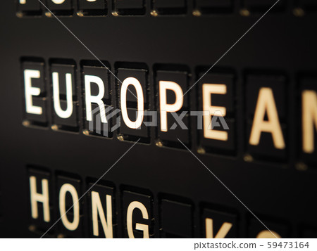 Signs name of European on black directory board.  59473164