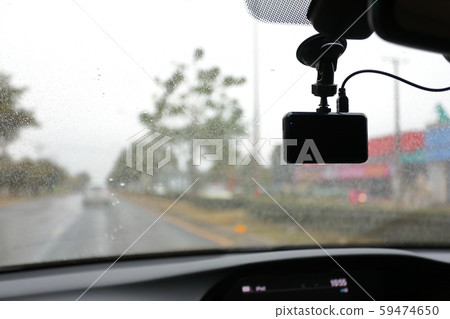 video camera recorder inside car driving rainy day 59474650