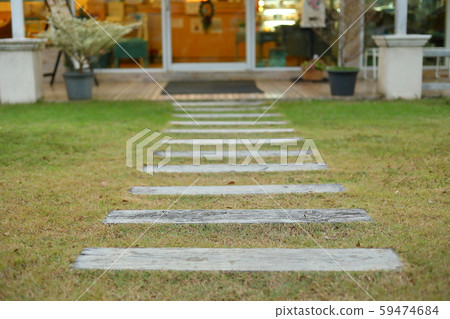 garden path in grass field of entrance cafe garden path in grass field of entrance cafe 59474684
