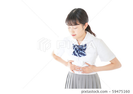 Female student in uniform suffering from menstrual pain 59475160