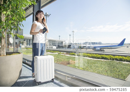 Airport plane woman 59475285