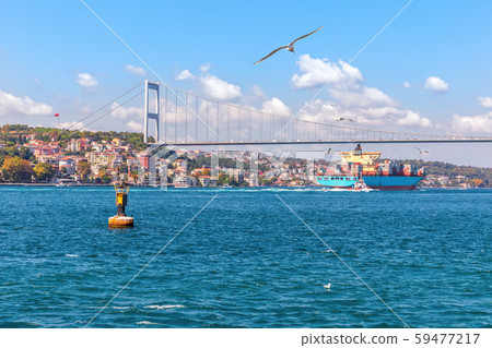 The Fatih Sultan Mehmet Bridge, the cargo ship and the Bosphorus view, Istanbul The Fatih Sultan Mehmet Bridge, the cargo ship and the Bosphorus view, Istanbul 59477217
